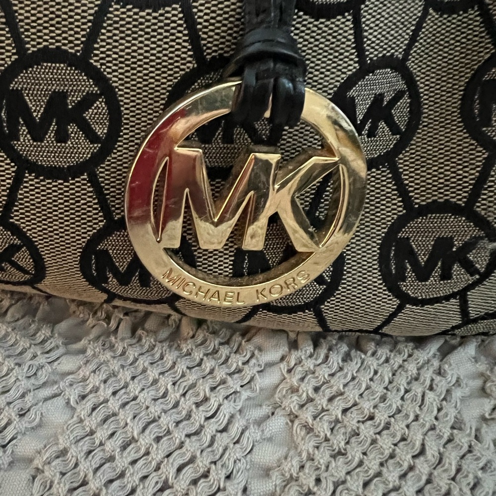 Lovely sexy Michael Kors monogram  doctor type hand bag.